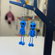 Boucles d'oreilles en argile "squelettes bleus"