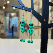 Boucles d'oreilles en argile "squelettes verts"